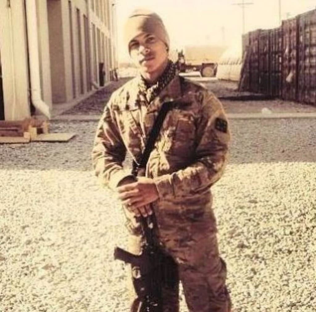 Philip Lilavois in U.S. Army combat uniform during his military service